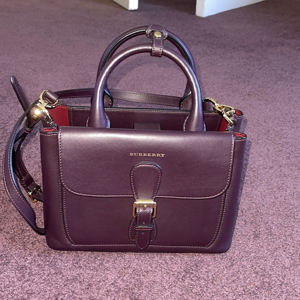 BURBERRY
Smooth Bonded Calfskin Small Saddle Tote plum